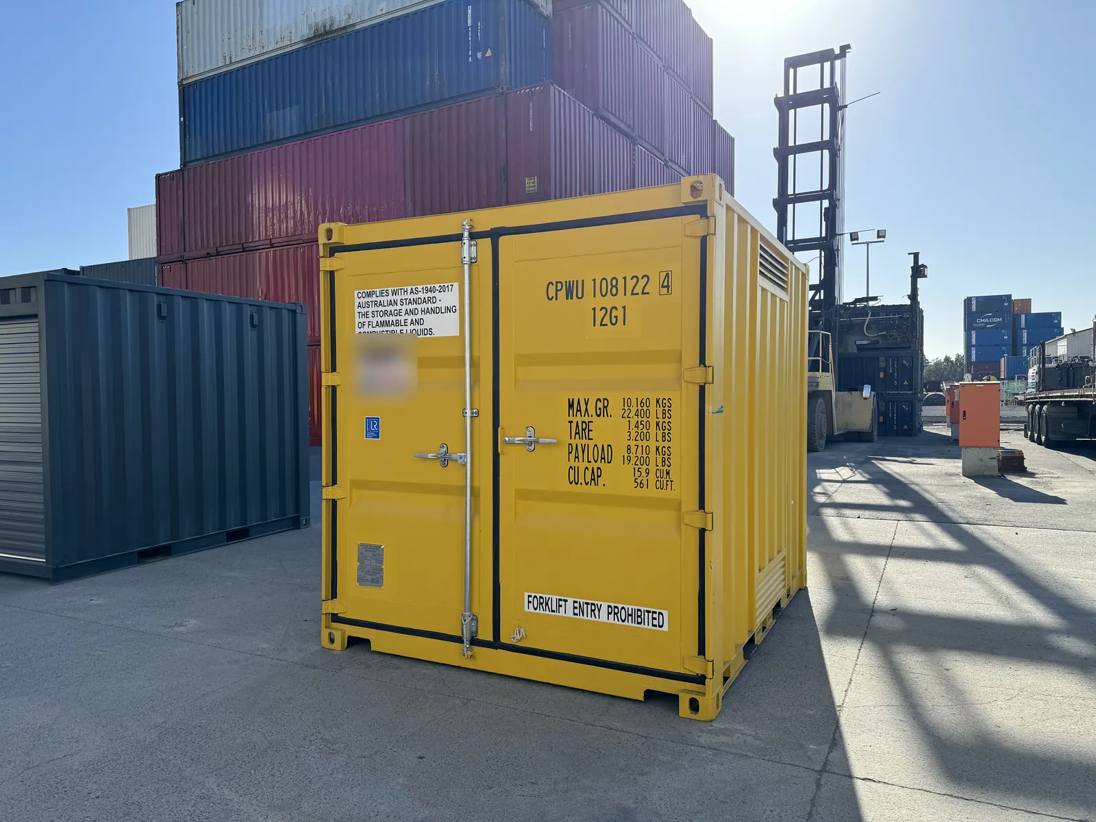 Yellow 10ft container with vent panels, doors end